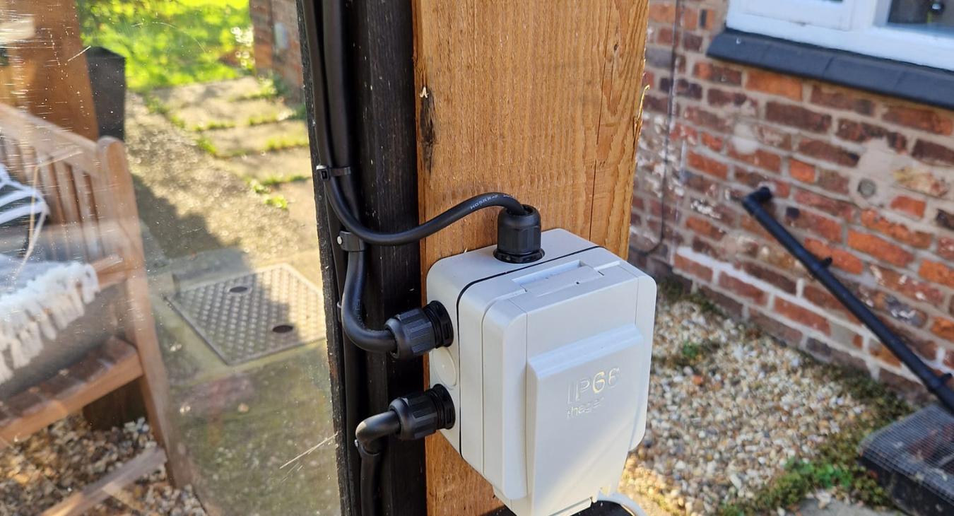 Outdoor socket for cooking area installed by C Smith Electrical in Bostock